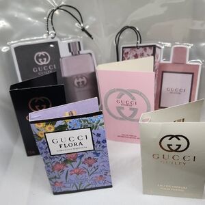Gucci Perfume Sample Collection with Floral and Pink Accents